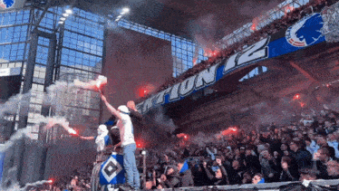 a stadium with a banner that says sektion 12