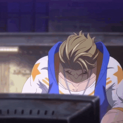 a man in a blue and white outfit is looking down at something