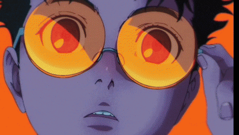 a close up of a person 's face wearing glasses