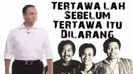 a man in a white shirt is standing next to three men in black and white