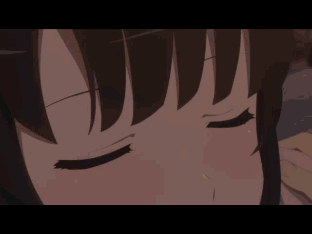 a close up of a person 's face with a surprised look on it
