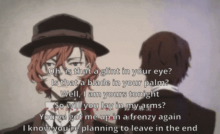 a man in a hat is talking to another man in a suit and tie