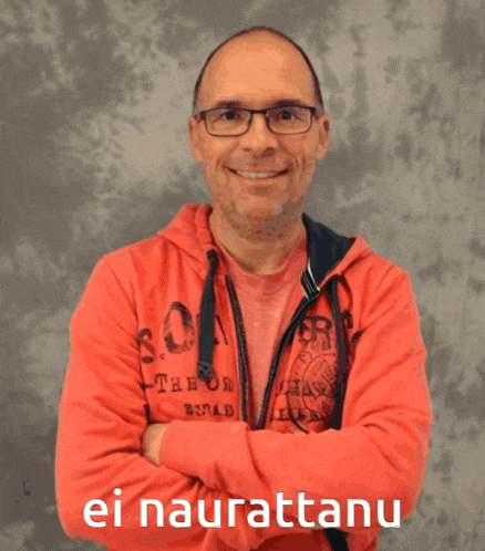 a man wearing glasses and a red hoodie with the words ei naurattanu written on the bottom