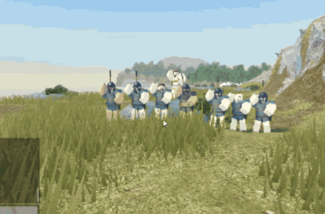 a group of soldiers are standing in a field