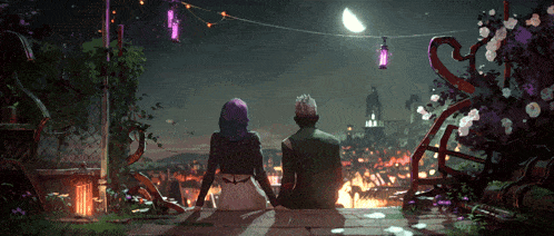a man and a woman are sitting on a ledge looking at a city at night