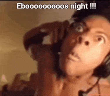 a close up of a person 's face with a caption that says " ebooooooos night !!! "