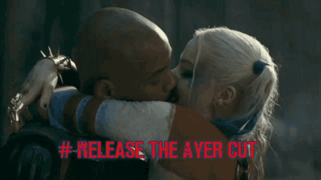 a man and a woman kissing with the words # release the aver cut above them