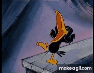 a cartoon crow is standing on a ledge with its beak open .