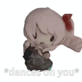 a stuffed doll with the words * dances on you * written below it