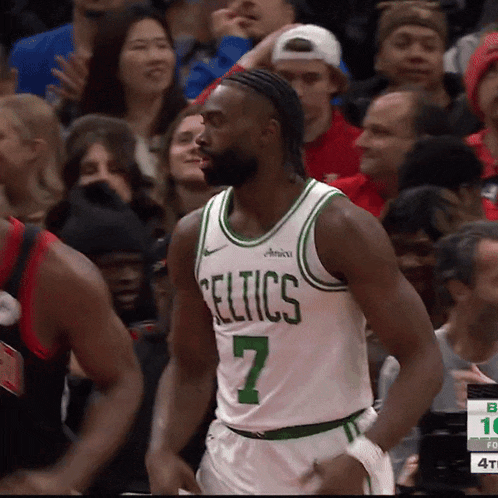 a basketball player wearing a celtics jersey with the number 7 on it