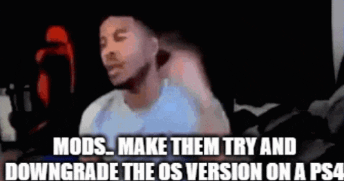 a man is sitting in front of a microphone with the words mods make them try and downgrade the os version