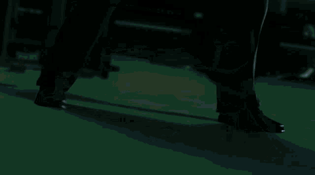 a man kicking another man in the face with the word neo on it