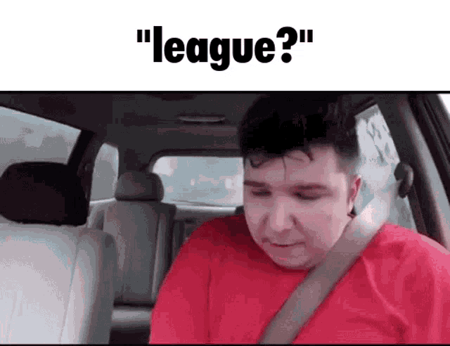 a man in a red shirt is sitting in the back seat of a car with the words " league ? " above him