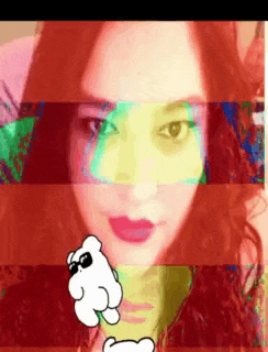 a woman with a mickey mouse hand pointing at the camera