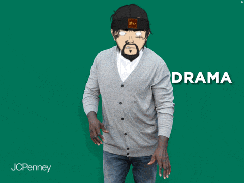 a man wearing a cardigan and a hat with the word anxiety on the bottom