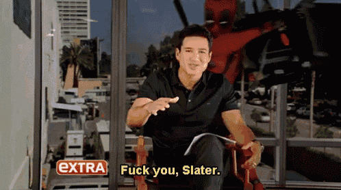 a man is sitting in front of a window with a sign that says extra