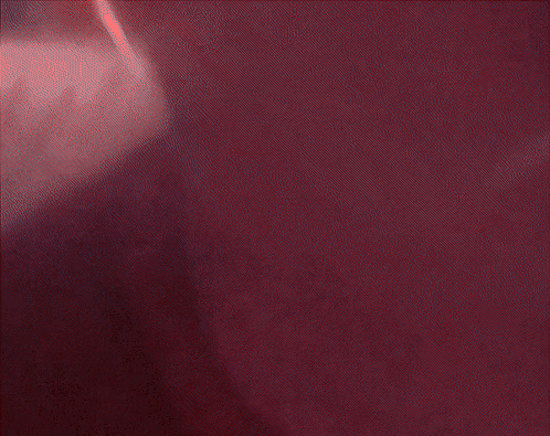 a red and purple background with a red star in the center