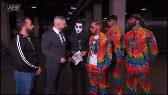 a group of men are standing next to each other and the word sustained is on the bottom