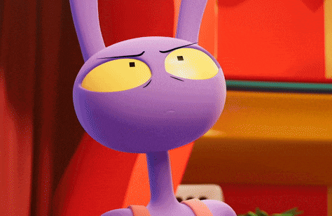 a purple cartoon character with yellow eyes and a pink top