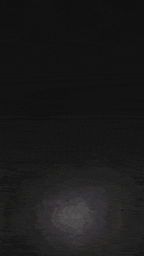 a red circle with a black border is surrounded by triangles on a black background
