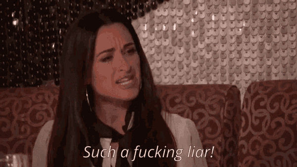 a woman sitting on a couch with the words such a fucking liar