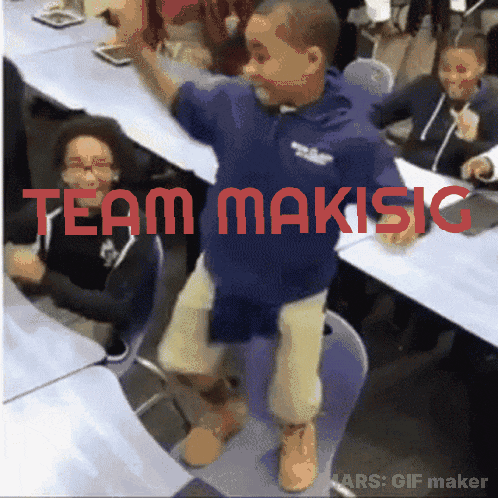 a boy in a blue shirt is dancing in a room with the words team makisig