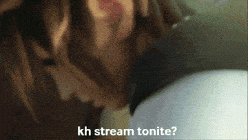a close up of a person with kh stream tonite written on the bottom