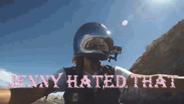 a person wearing a helmet with the words jenny hated that above them