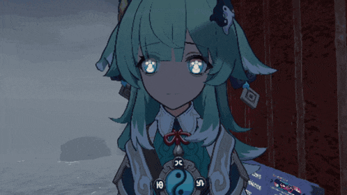 a girl with green hair is wearing a necklace with a ying yang symbol on it