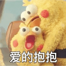 a couple of stuffed chickens are hugging each other .