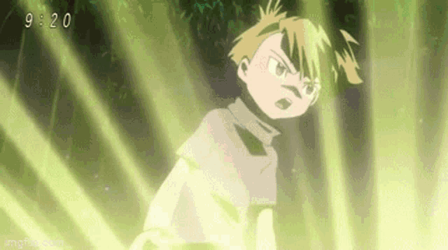 a young boy is standing in a forest with a sword in his hand and a green light behind him .