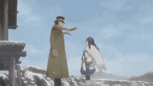 a man and a girl are standing in the snow