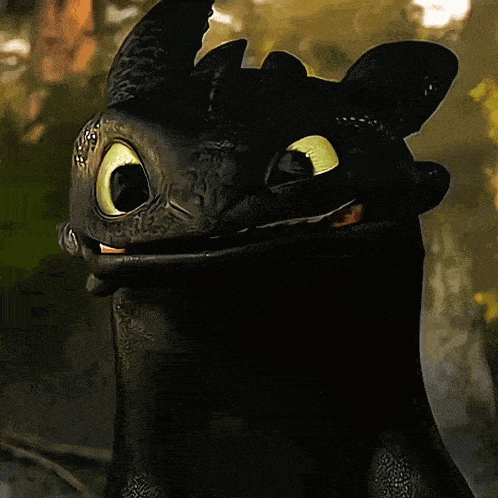 toothless from how to train your dragon is smiling with his mouth open