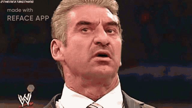 a man in a suit and tie with a reface app on the bottom