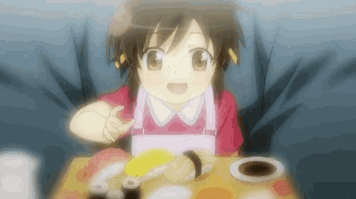 a little girl in an apron is sitting at a table with sushi and giving a thumbs up