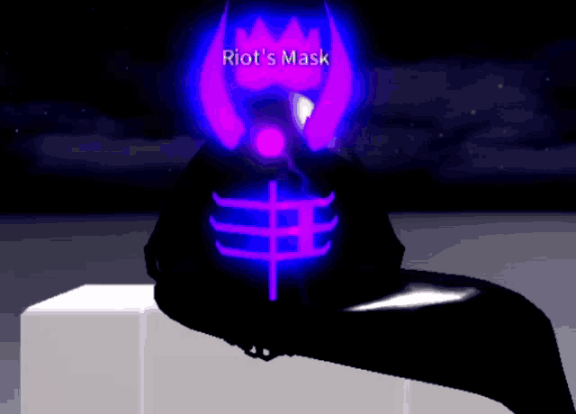 a riot 's mask is sitting on a cube in the dark