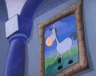 a cartoon painting of a white horse with a pink nose is on a wall .