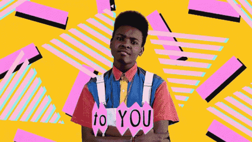 a young man holding a sign that says to you