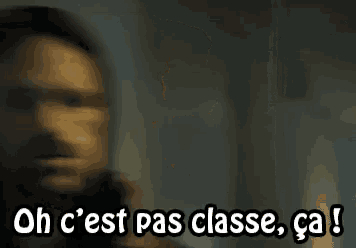 a man with a beard is standing in a dark room with the words `` oh c 'est pas classe , ca ! ''