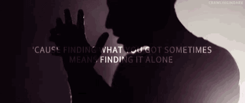 a silhouette of a man with the words ' cause finding what you got sometimes mean finding it alone ' on it