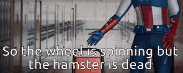 a picture of a man in a superhero costume with the words so the wheel is spinning but the hamster is dead