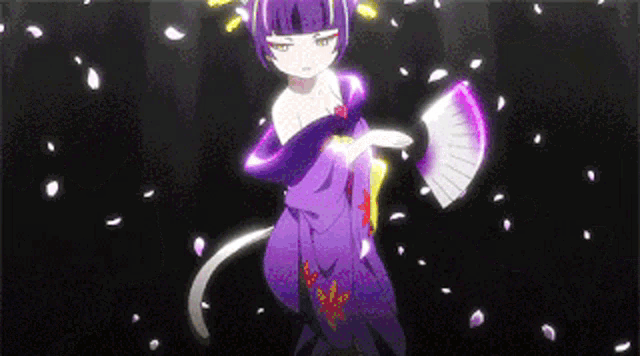a girl in a purple kimono is holding a fan and petals are falling around her .