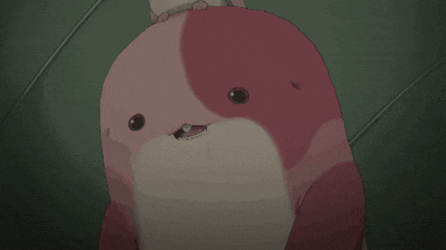 a stuffed animal with a spiral on its chest