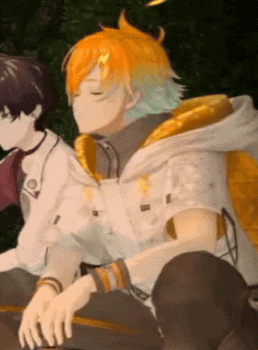 a boy with orange hair is sitting next to another boy with green hair