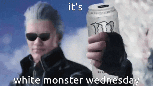 a man in sunglasses is holding a can of white monster energy drink .
