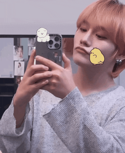 a person is taking a picture of themselves with a casetify phone