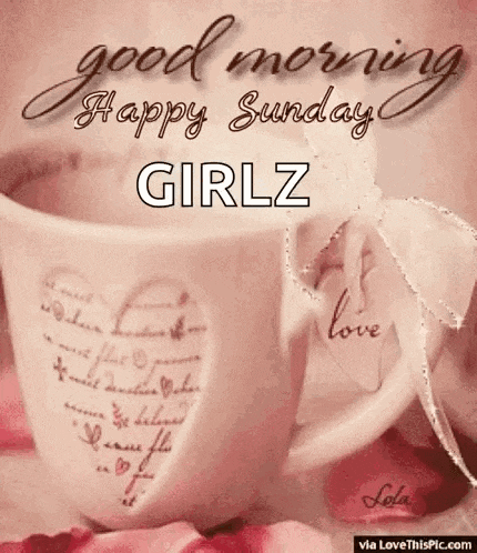 a cup of coffee with a heart on it is sitting on a table .