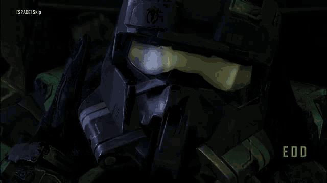 a close up of a helmet with edd written in green