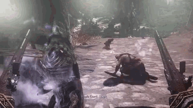 a screenshot of a video game shows a man laying on the ground while a monster appears in the background