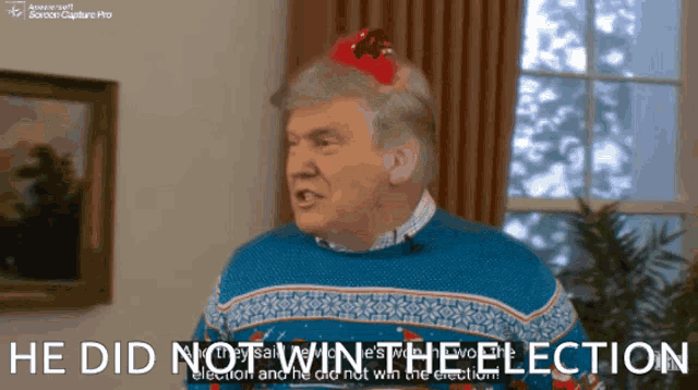 a man in a blue sweater says he did not win